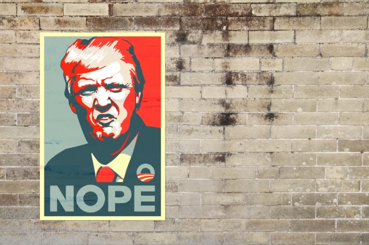Cartel de Donald Trump en un muro