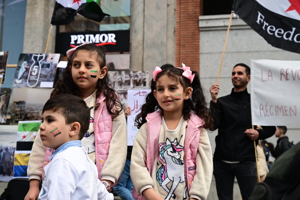 Niños en la reunión de la celebración de la revolución siria el sábado pasado en Madrid. Foto: Okba Mouhammed