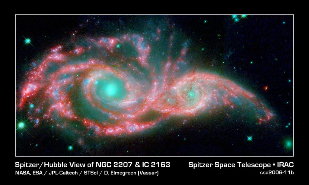 NGC2207+IC2163 en IR tomadas por el Telescopio Espacial Spitzer. Imagen: NASA/JPL (dominio público)