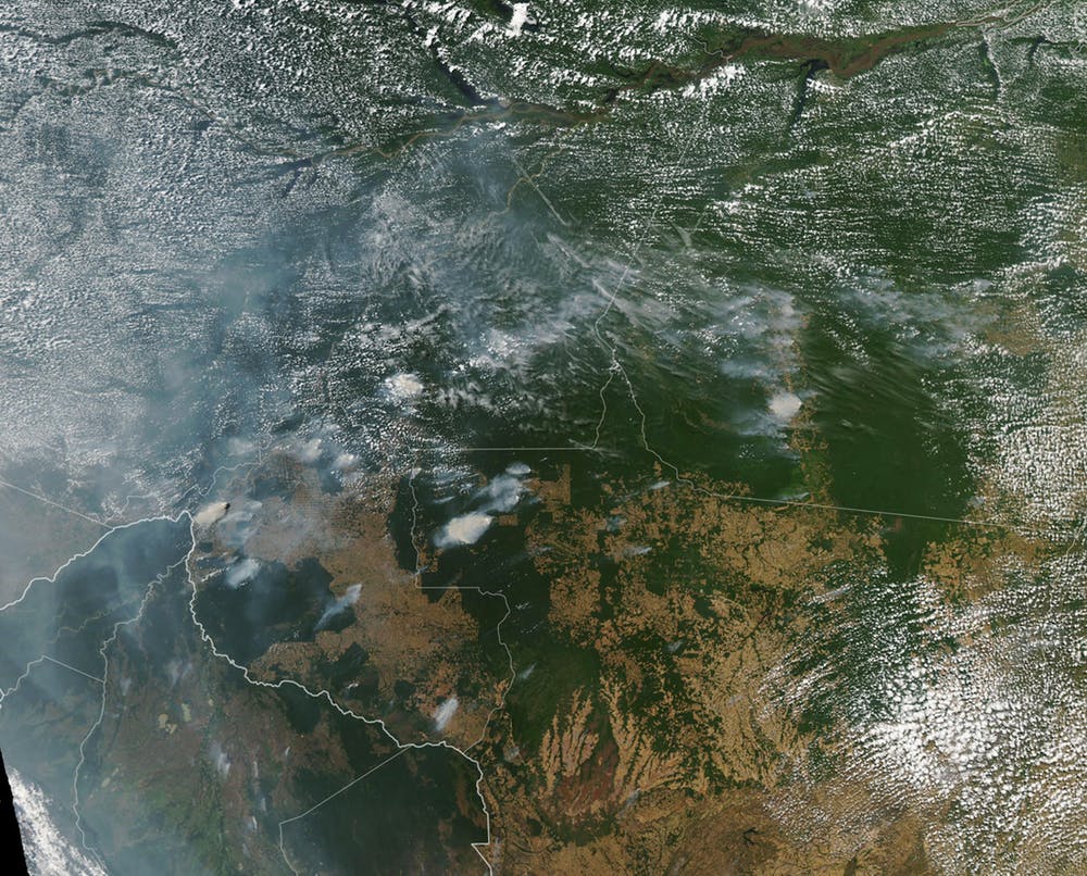 Imagen de satélite que muestra varios incendios en los estados brasileños de Rondônia, Amazonas, Pará y Mato Grosso (11 y 13 de agosto de 2019). NASA Goddard Space Flight Center/Flickr, CC BY