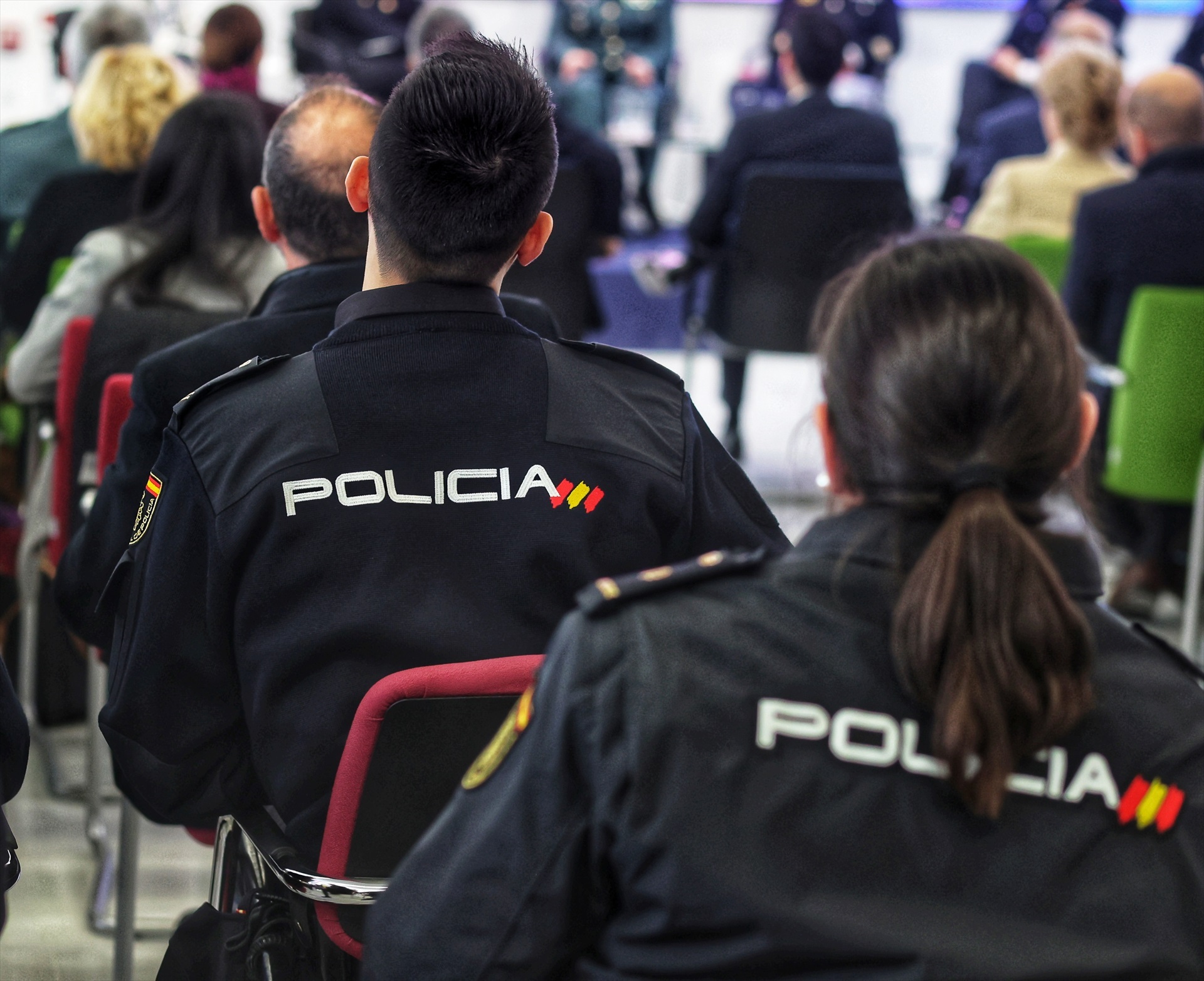 Varios agentes de Policía Nacional durante la inauguración de las III Jornadas sobre Mujer, Igualdad y Seguridad, en el Centro Tecnológico de Seguridad en El Pardo, a 6 de marzo de 2023, en Madrid, (España). Foto: Ricardo Rubio / Europa Press