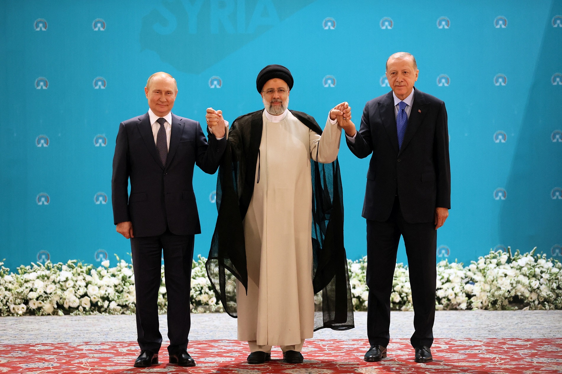 El presidente ruso, Vladimir Putin, el presidente iraní, Ebrahim Raisi, y el presidente turco, Tayyip Erdogan. -Sputnik/Sergei Savostyanov